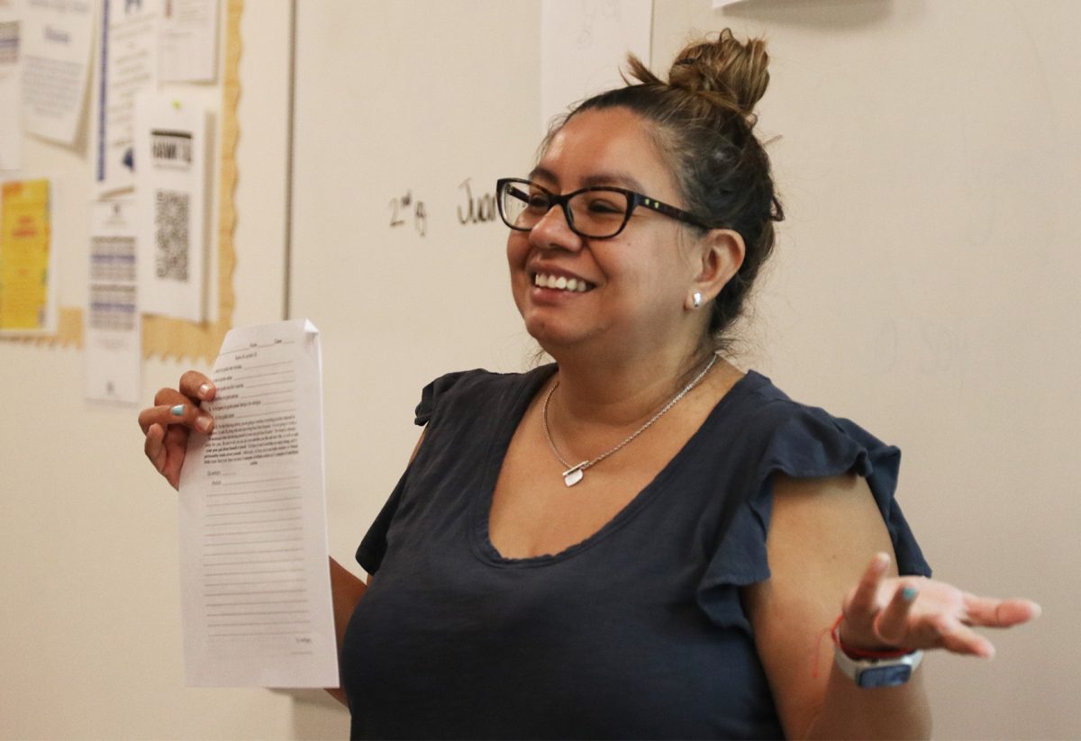 Spanish teacher Berenice Colmenero explains a vocabulary assignment to the class. Colmenaro said that teaching Spanish makes her feel closer to her culture. 
