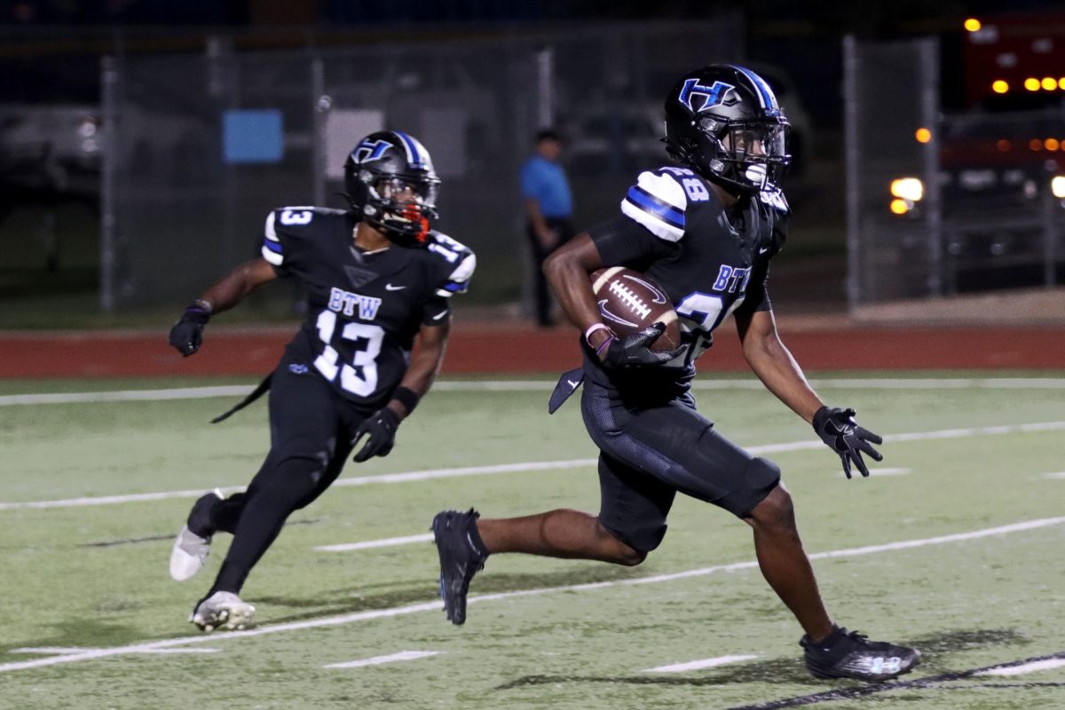 Running back Marcus Johnson during the game against Southlake Carroll. It was the team’s home opener, which they lost with a score of 16-59.