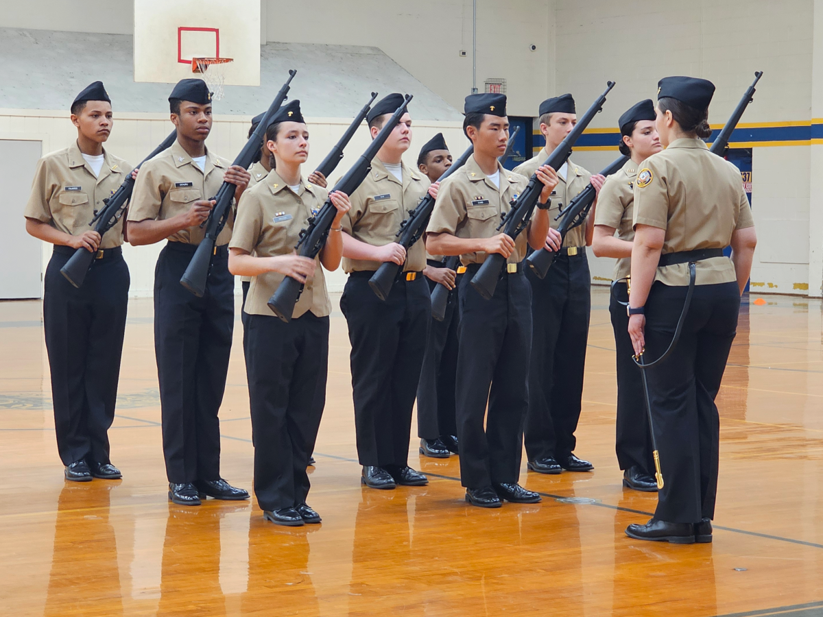 The armed platoon performs its routine during a meet earlier in the year. NJORTC’s preparation for the state qualifier meet started at the beginning of the school year. (Photo provided by public affairs officer Madeleine Collins.)