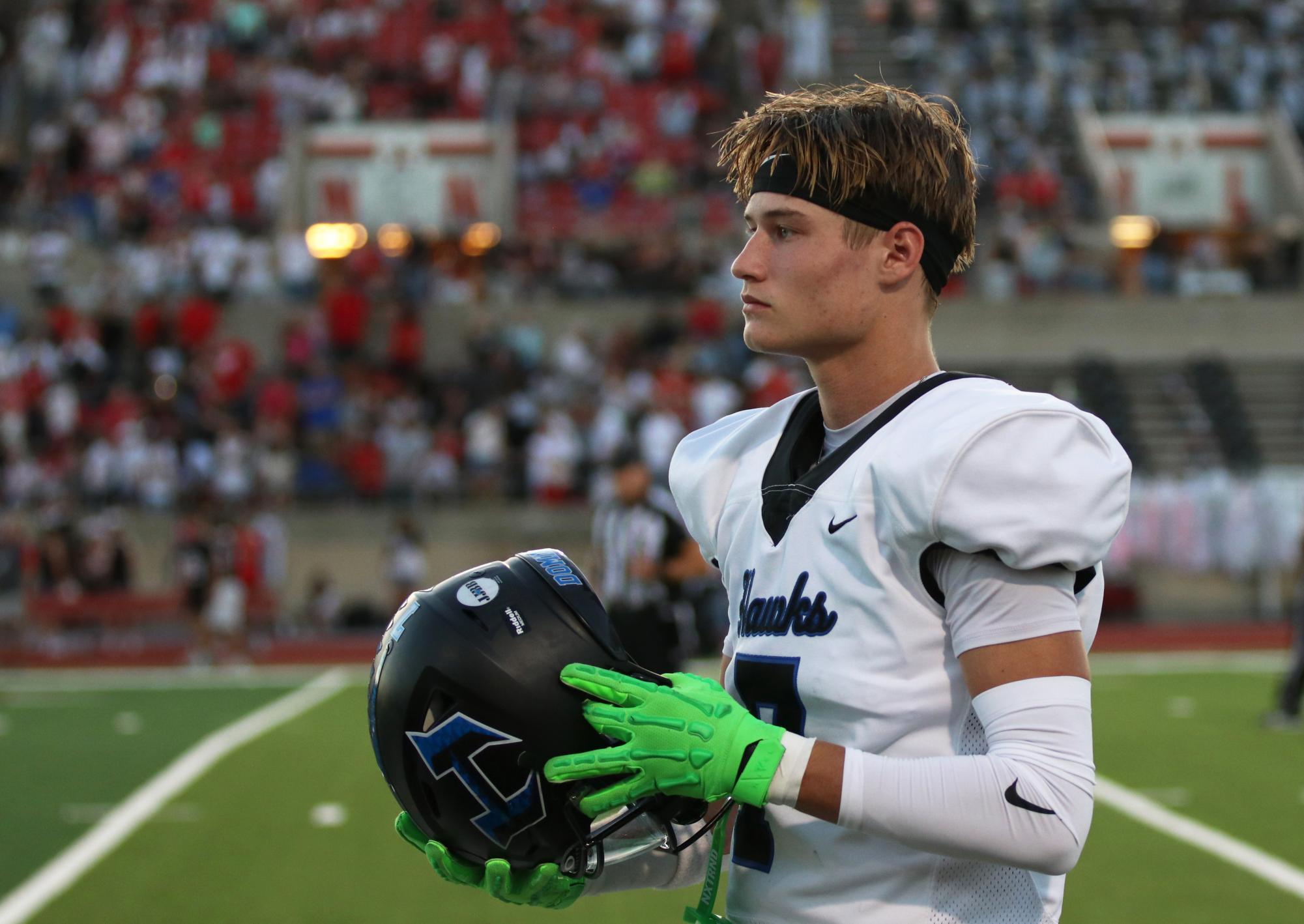 Wide receiver Tyler Hoke stands on the sidelines before the start of the game at Coppell on Sept. 27. The team lost the game 14-49.