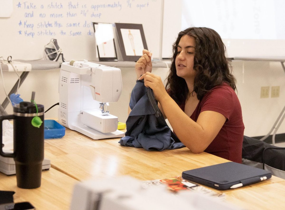 Senior Carys Sherer works on a project during class on Sept. 27. The class was working on sewing halter tops.
