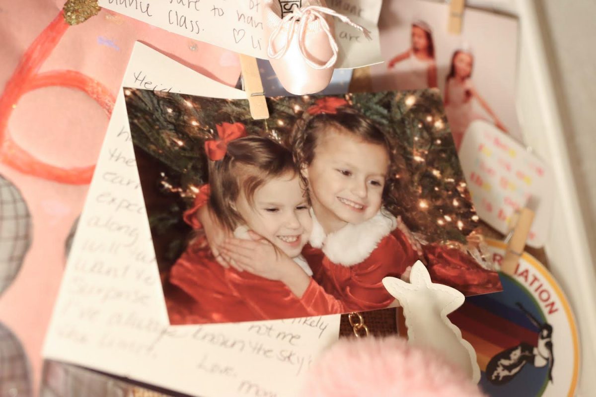 This photo of my sister and I on Christmas Eve 2009, hangs on my bulletin board above my nightstand. It is a cherished memory I know I can never relive the same way again.
