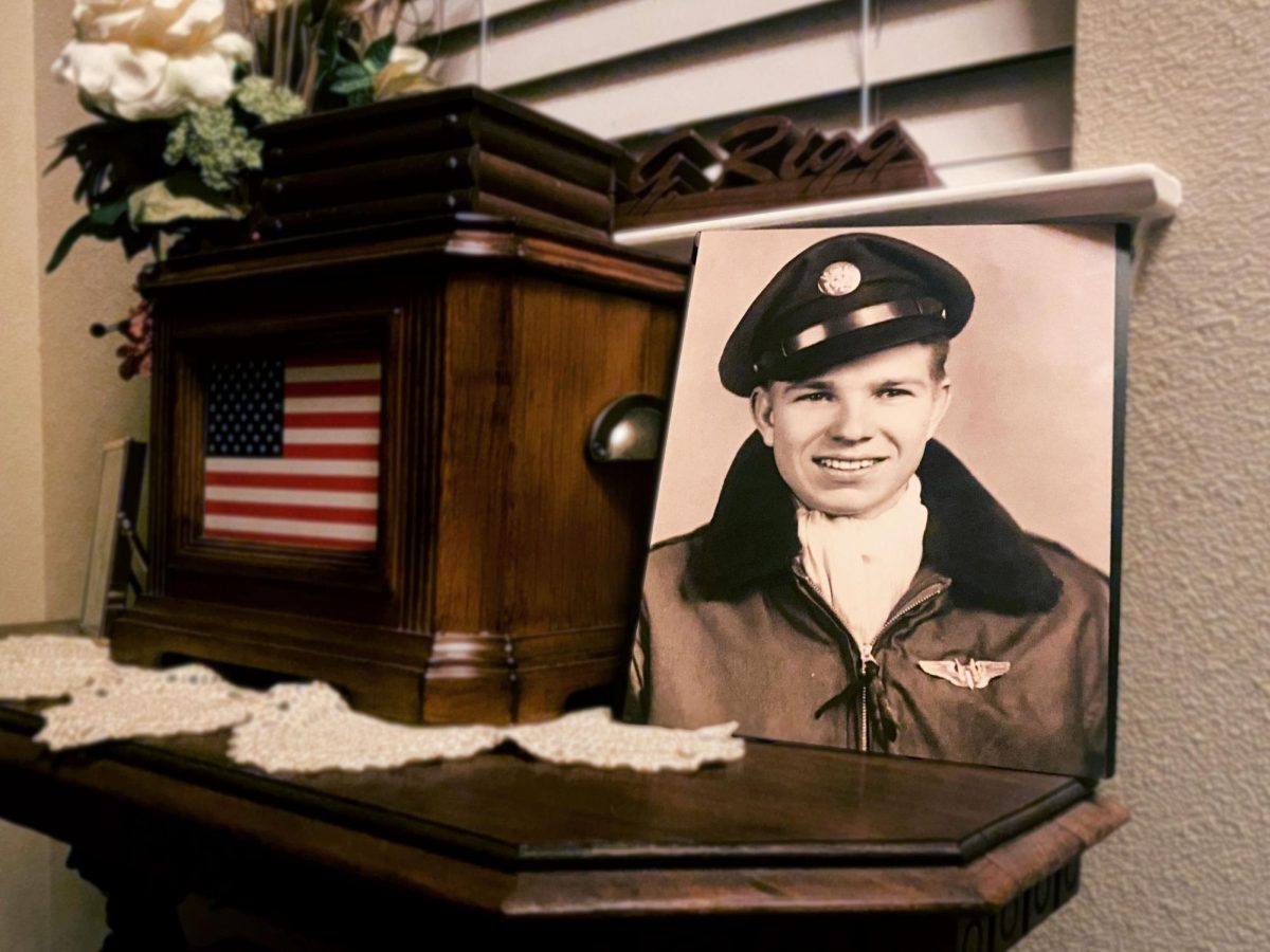 A picture of my great grandpa sits near the entryway of my grandma’s house. The box next to it contains his ashes and an American flag to commemorate his service. 