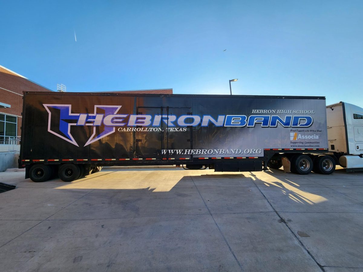 The old band trailer, “The Beast” sits in the parking lot. The trailer was refitted, refurbished and repainted by band parent volunteers in 2007. (Photo provided by Richanda Bryant)