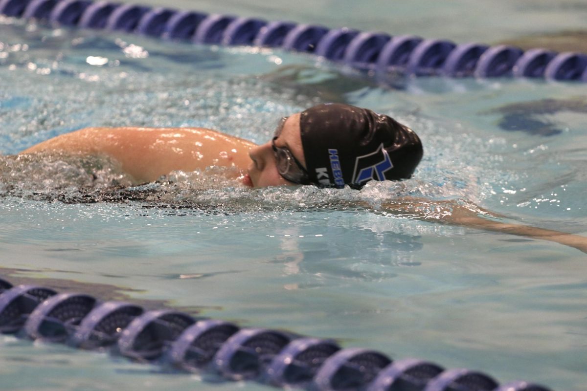 Sophomore Rebekah Knighton practices freestyle during morning practice on Jan. 22. The swim team will compete in the district championship meet on Jan. 24 at the LISD Westside Aquatic Center.
